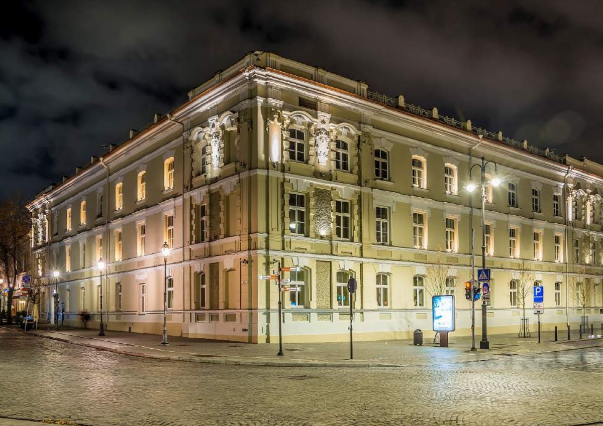 Historic palace facade at night