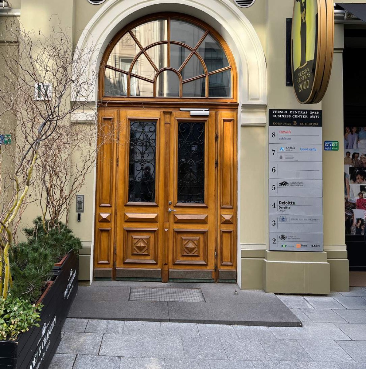 Solid wood entrance door with arched glazing